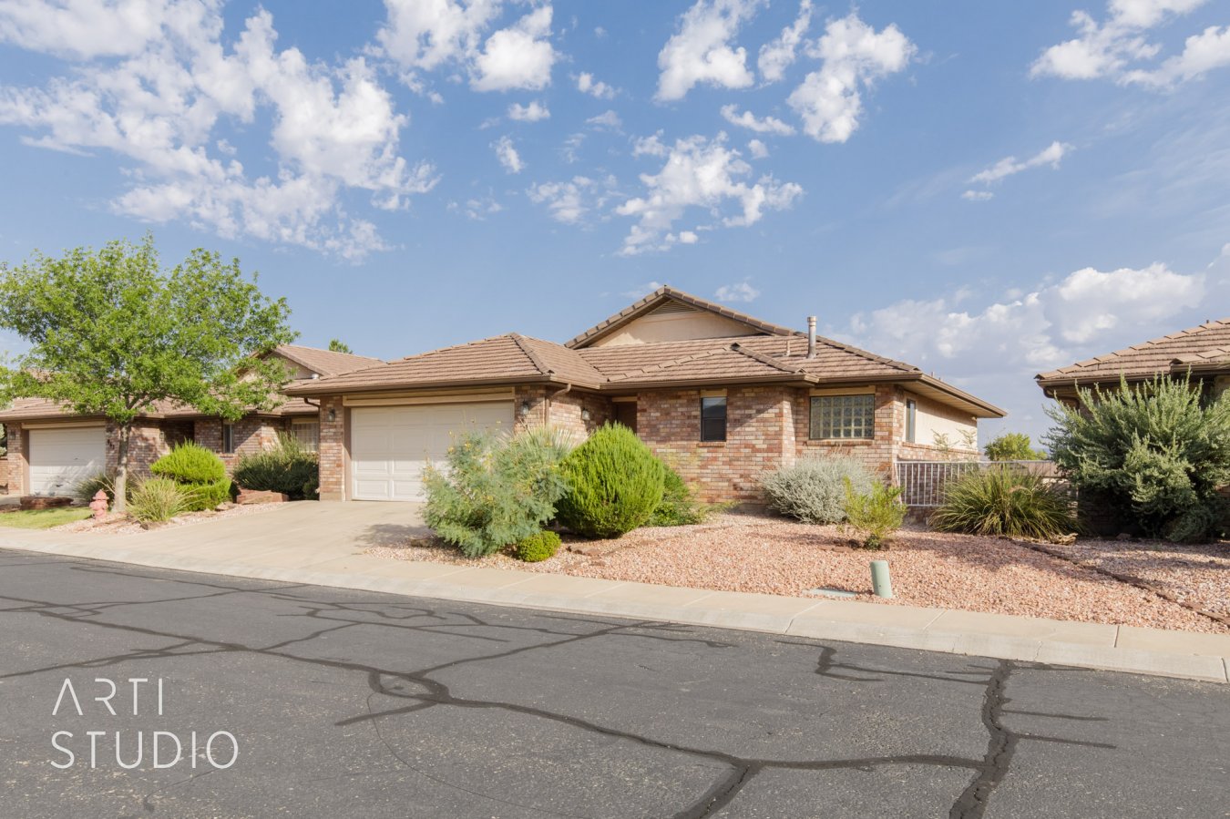 51781 Amazing location with fabulous views looking at Pine Mtn. & Snow Canyon. Open floor plan with vaulted ceilings and lots of storage. Covered patio up and down with walk out lower level. Close to all of the wonderful HOA amenities, including a work out room, indoor pool, outdoor pool, tennis courts and pickleball courts.