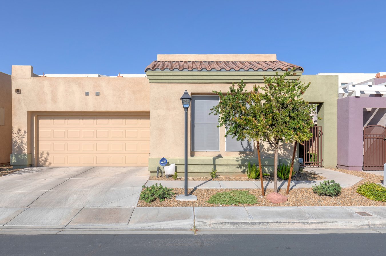 Beautiful single story home with 3 bedrooms/3 baths located in gated community of Central Park Estates. This quiet, well-manicured hidden gem of a neighborhood is conveniently located just minutes from the Strip, Raiders Stadium & airport as well as all kinds of shopping & dining. Gated courtyard entry leads to front door & then also to backyard as well. Once inside, you will love the high ceilings that add to the open spacious feeling. Plantation shutters & solar screens throughout plus laminate & tile flooring - no carpet! Large kitchen offers granite, an island w/breakfast bar seating, spacious dining area, a desk & pantry. Primary BR is separate from others & has a walk-in closet plus 2 additional closets. BR's 2 & 3 are on the other side of home, one of which features its own private bath w/walk-in shower. Private backyard has covered patio & easy maintenance landscaping. HOA maintains front yard. Community amenities include pool, spa, playground, basketball, tennis & much more!