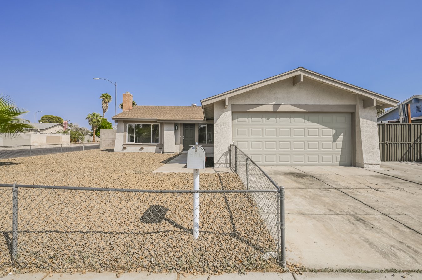 52108 CHARMING 1-story Home, 3-bedrooms! 2 baths, RV Parking! Great Natural Light and Neutral Paint Colors. New laminate flooring, NEW carpet throughout!!! Cozy Fireplace in the Living Room. NEW white cabinetry, designer cabinet hardware, beautiful quartz countertops, & NEW SS APPLIANCES!! Modern fixtures! Oversized Backyard with covered patio and storage shed. Move-in ready!!! Bring Your Buyers!