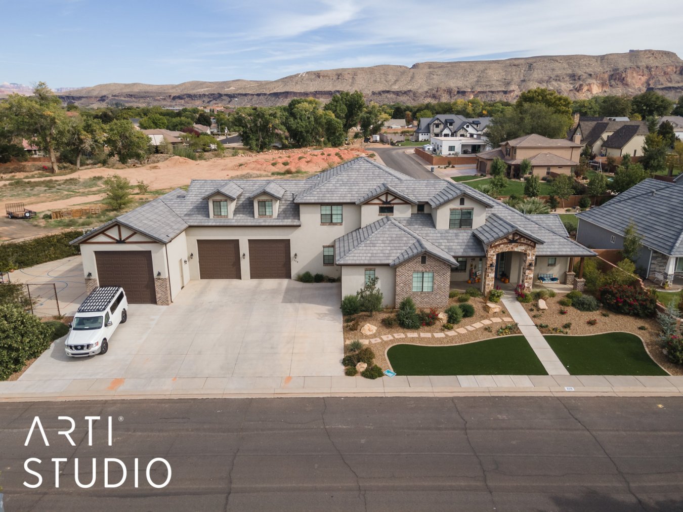 52463 Massive 45 ft pull through RV garage Second 12 x12 pull through garage. Beautiful pool with rock slide and jumping stand. Kitchen, dining and living are all joined together giving the feel of a huge open space when coming into the home.