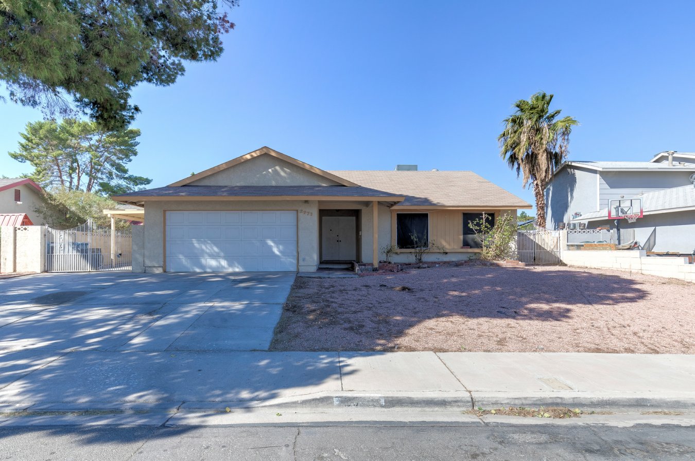 52484 Ready and waiting for you!! Classic single story on a large lot with a pool!! This property boasts a covered patio, huge yard and great parking for your RV, Boat, ATV's or Jet Skis!! This Vegas home has a large eat-in kitchen, big primary bedroom with 2 additional bedrooms, primary bathroom features a stylish sunken tub and a 2 car garage!! Check this one out before it's gone!!