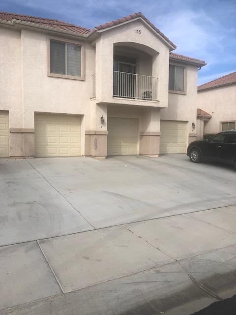 52524 Three bedroom two bath with 2 car garage condo in The Springs.