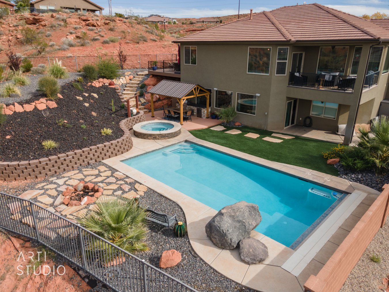 52844 Check out this amazing home where you will love the outside as much as the inside! Upgraded flooring, granite, & custom finishes throughout. Wonderful storage, bedrooms & living room to spread out. You'll love that it has open space behind, in front of, & beside the house to enjoy views & wildlife. The backyard is not to be missed where you'll enjoy a pool, hot tub, fire pit & outdoor kitchen!