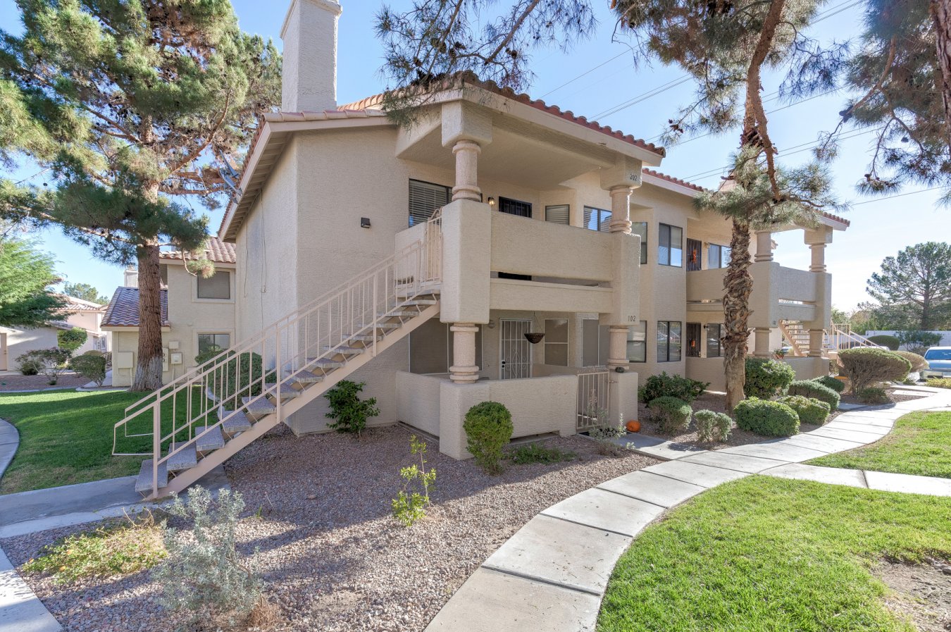 53261 Enjoy the tranquility and the view from this second-floor condo on the outskirts of Summerlin. Spacious and open floor plan. Two-bedroom and two-bathroom with recent remodeling. Tile flooring in traffic areas and carpeting in the bedrooms. Granite countertop and breakfast bar in the kitchen. Stainless steel appliances in the kitchen and full-sized washer and dryer stay. There is a newer air conditioning unit. This home is located close to the 110 acre Kellogg Zaher Sports Complex. It is just a few blocks away from Lowe's Home Improvement, Winco, Trader Joe's, and Highway access. A short drive to Boca Park and a profusion of restaurants, shops and casinos.