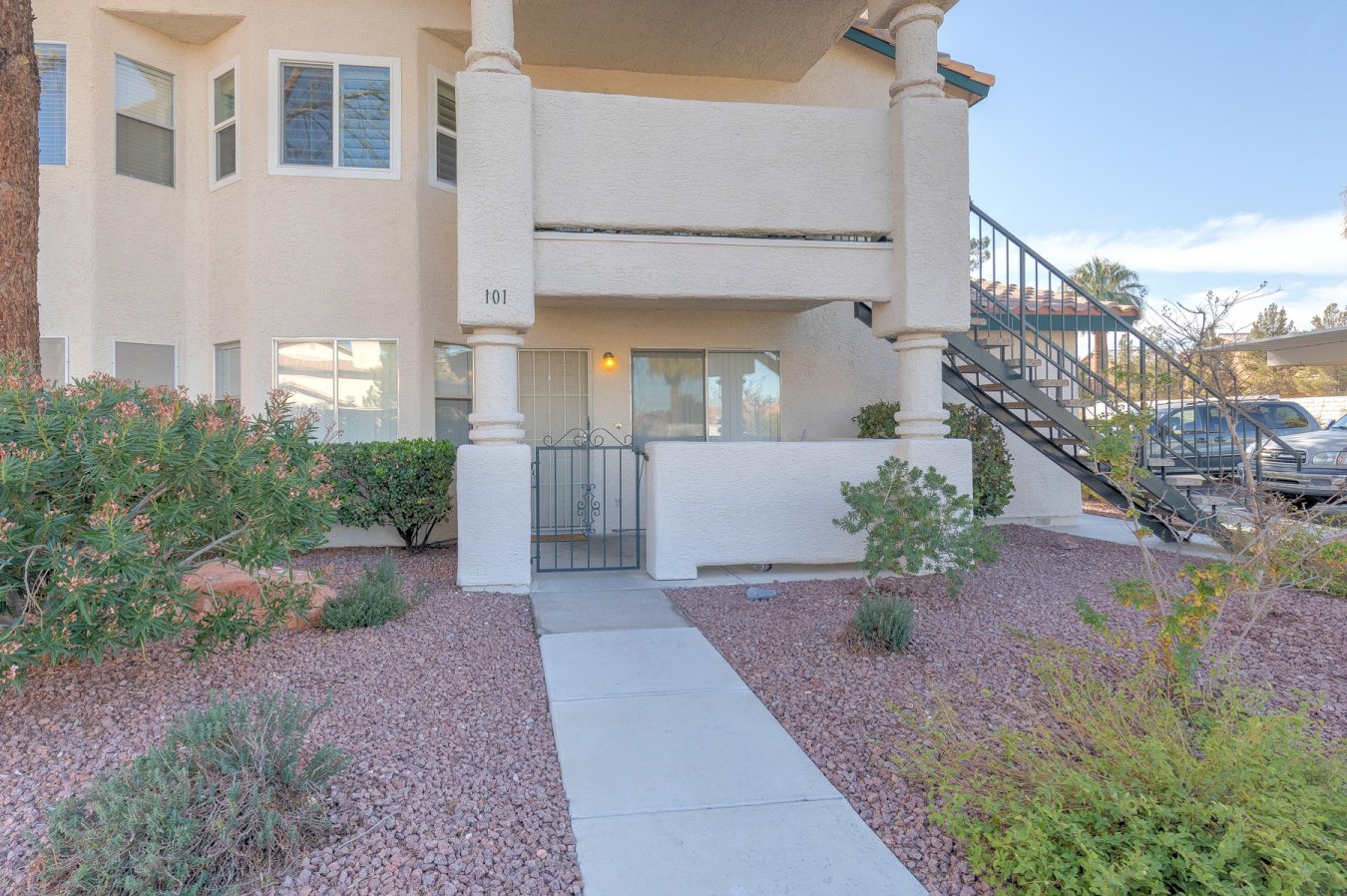 Brand new stainless steel refrigerator, stove and microwave are included in this clean and ready to go property. This ground unit has new luxury water proof vinyl in the bathrooms, large great room with a fireplace, nice sized bedrooms, washer and dryer and a huge storage room. This property is located near shopping centers, restaurants, big box stores, houses of worship, freeway access, soccer and tennis facilities, parks, golf courses, bike trails and right at the edge of Summerlin!