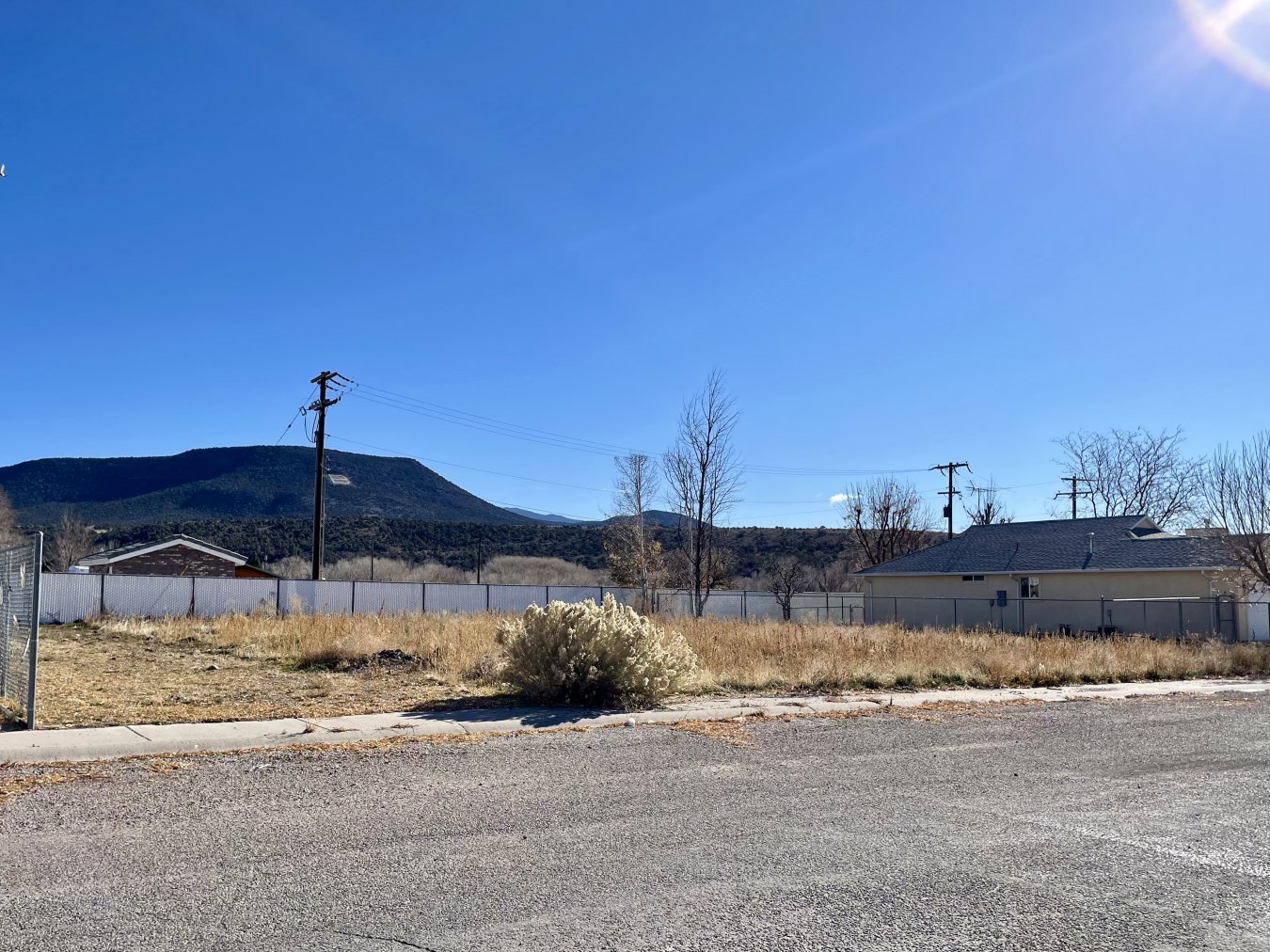 53433 Beautiful lot, prime location in the sought after Stake Center subdivision. Well established neighborhood with newer homes. Close to golf course, elementary school, and walking path. This lot is ideal at 99'x99', fenced at back and sides, ready for your dream home! Drive by and take a look. Utilities are in the street.
Directions: From Main Street in Beaver, go EAST on 200 N, turn RIGHT on 1370 E into the Stake Center Subdivision. Lot 14 is on the left toward the end of the street.