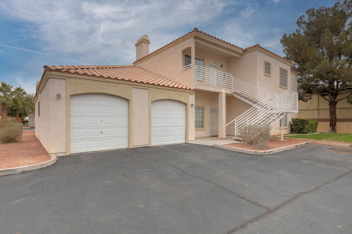 53968 Let's start with an attached garage with direct entry to unit!! This leads into an open living area with 9 foot ceilings, a beautiful fireplace and kitchen! Beyond that you'll find 3 great bedrooms with wide doorways - one has a double door that would make a fantastic home workspace! The primary has it's own patio, storage and walk-in closet! The primary bathroom boasts double sinks and a garden tub as well! With a little TLC this could be a gem!