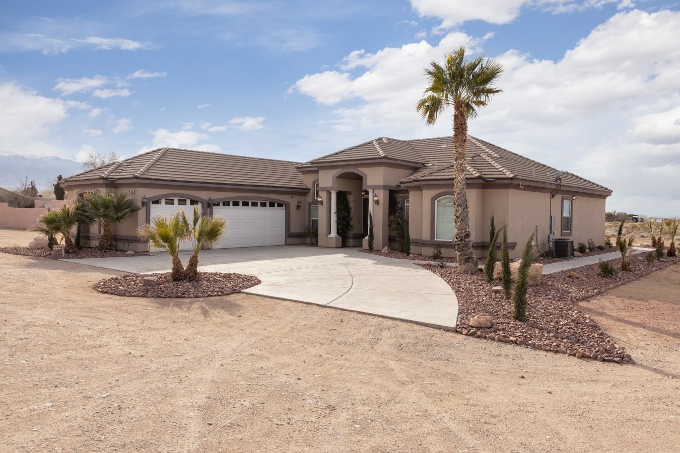 You don't want to miss the opportunity to own this AMAZING Custom home located at 3655 Shivwitts Drive in the Beautiful Scenic Arizona community. This custom home is 2613 sf 4 bedrooms with 3 baths. This Great home is located on 1.13 acres. Which gives you plenty of room to have horses or build a garage for all your toys because you'll have access to the mountain trails that the Virgin Mountains offer. You'll love taking your first step inside the front door, you'll notice the unique custom ceilings, plenty of windows allowing for natural light throughout. The Kitchen designed has a floating island that provides the head cook with excellent views to the covered patio through the French Doors. It is complimented with black granite counter tops and stainless-steel appliances. Enjoy the spacious master bedroom and bathroom that has two walk-in closets, separate walk-in shower, a beautiful jetted soaking tub, and dual vanities. It also has access to the back patio! All rooms have ceiling fans. The family room has a wood burning fireplace and a dry bar, perfect for entertaining. Did I Mention there's a 3-car garage. Also the water is supplied by the Virgin Mountain Water Company.