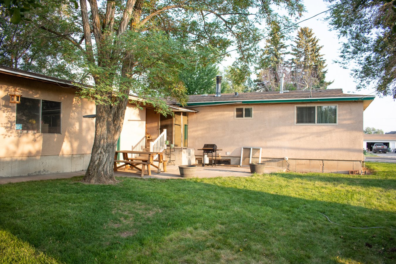 54597 This is a 4 bedroom 1 and 3/4 Bathrooms at a GREAT price. It has an upgraded Kitchen with 3 bedrooms upstairs and one in the unfinished basement. A very large attached garage...storage shed in the back along with an automatic sprinkler system in both front and back yard. This home is very neat and clean and awaiting your individual fixing up skills! Move in ready. This home will not last long. Seller has added the lot to the West of the home. Making it approximately a 0.44 total acre lot (was 0.23) with the home. Seller is also going to redo the front steps and upgrade the electrical in the garage and home.