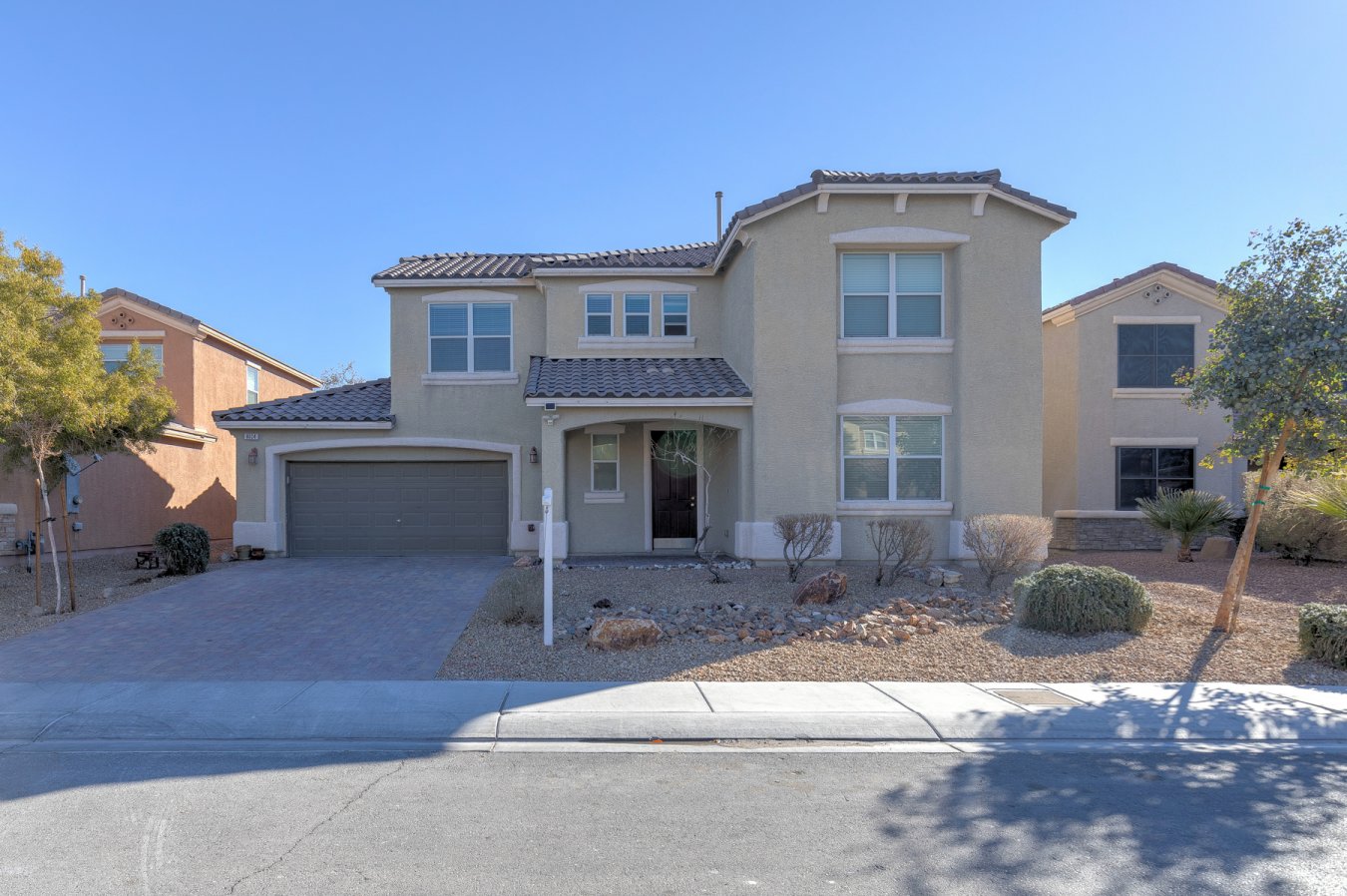 54607 This is one you definitely want to see! Incredibly clean, freshly painted stunner, with big, pool-sized back yard. Enjoy the privacy at the edge of town, with a spectacular mountain view. This home has a three-car tandem garage, with an extra, finished, storage room built onto the garage as well. Granite counter tops, beautiful cabinets, stainless steel refrigerator, and a private spa. Desirable, open floor-plan downstairs. Welcome home!!