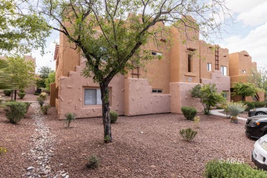 56991 Location-This condo is conveniently located on the outside of the Enchantment subdivision making it easy to find and great for parking, but best of all is steps away from the common pool/spa area.