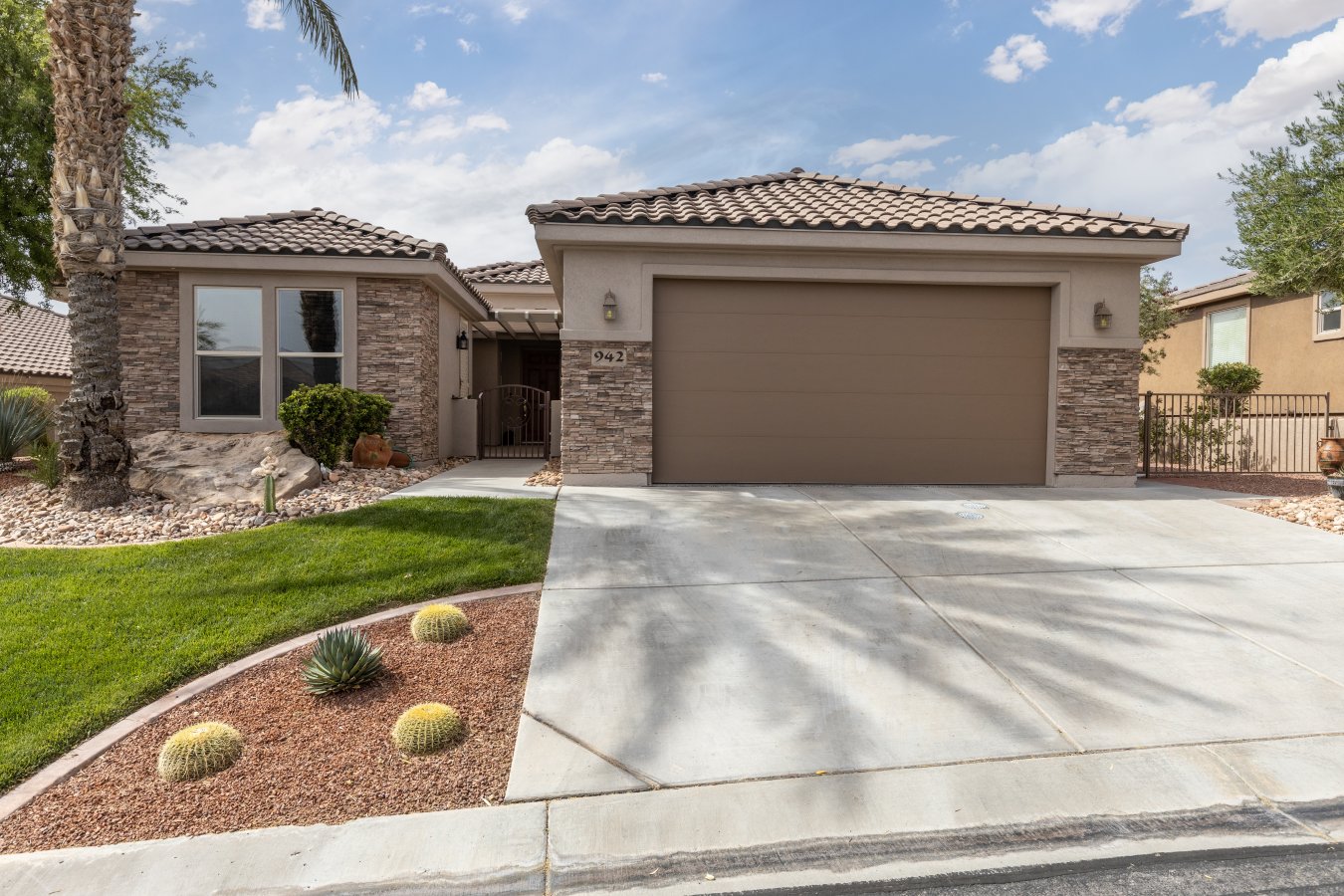 57044 This gorgeous home sits on an elevated lot. The view is exceptional with varying vistas of purple mountains & the Falcon Ridge Golf Course. The landscaping is distinctive as the outdoor spaces allow you to enjoy the beauty of the desert. A variation of cactus and trees. The interior is lined with windows, highlighting the view and immediately showcases the remarkable outdoors. The kitchen is the heart of the home. Ample space to move around with others and create memories that will last a lifetime. Solid surface counter tops and cabinets galore. Plus, a pantry that will allow the chef in you to store all your favorite tools. The master bedroom is a dream with every thought put right into it. Your master bath with a sunken tub and stand-alone shower. A second bedroom has the option of being a casita with its own entrance and privacy screen door. The garage is so clean and well equipped with almost wall to wall storage, and epoxy floors. Plus, a bonus room with more shelving. Brouse this home before ever arriving follow this link and be ready to want to be here sooner than later: https://my.matterport.com/show/?m=tQLDFkTTHCH