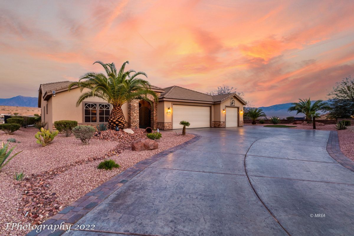 57677 Fully furnished and ready for IMMEDIATE move-in! Situated on .33 acre elevated pie shaped lot, this custom home is a rare find w/ nearly 1,000SF of garage space and 2,552SF of open living space. The PANORAMIC view is exceptional with varying vistas of purple mountains & the Canyons Golf Course. The landscaping is distinctive as the outdoor spaces were recently updated & thoughtfully designed offering a new built in BBQ, fire pit, spa and unique water feature that was created just for this peaceful space. The home sits far off the street as a lengthy drive leads you up to an elegant entry gate. The interior is lined with windows, highlighting the view and immediately showcases the remarkable outdoors. The great room is anchored with a stone fire place that reaches to the ceiling. A significant Quartz covered island is appreciated in the kitchen & soft closing cabinets are gorgeous. The appliances are stainless steel and the gas range is a bonus. The den/office has high ceilings & custom cabinetry. The bedrooms are large & the bathrooms are luxurious with granite and tile surround showers. The laundry room is full of cabinets & the needed 3 car garage has plenty of storage.