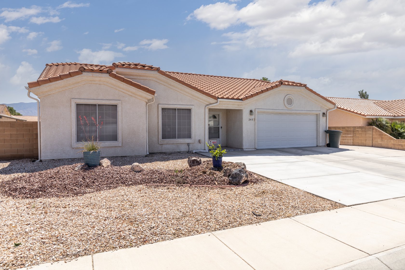 57820 Price Reduced !!! Come check out this beautiful 2 bedroom plus Den, no HOA home in Jack Hardy Estates! As you step in the home you will find a wide open floor plan with large vaulted ceilings making this home feel very large and spacious. The Den is located just off the entrance with built in cabinets and beautiful glass French doors. Just down the hall you will find a bedroom and guest bathroom. On the opposite side of the home lies the master suite with beautiful double doors leading to the back patio and a very large walk in closet. The dining room is also spacious with built in cabinets and a door leading to the back patio. Out back you will fined a beautifully tiled patio and a fully landscaped and fenced yard. Both sides of the home are gated with very nice iron gates perfect for pet runs or just extra toy storage. Extra Driveway has been added to the home for parking of all your toys.