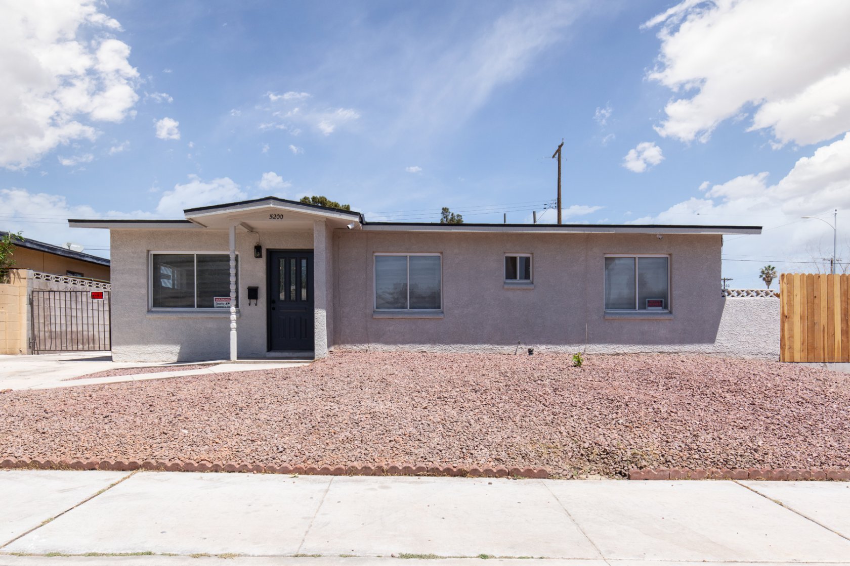 Fantastic like new, little corner house on a large lot. This home features a newer roof (2 years old) New A/C, Water Heater, Paint, Cabinets, Granite, remodeled bathrooms. New Carpets, blinds and stainless steel appliances. Large storage room with laundry are and washer and dryer. A pleasure to show.
