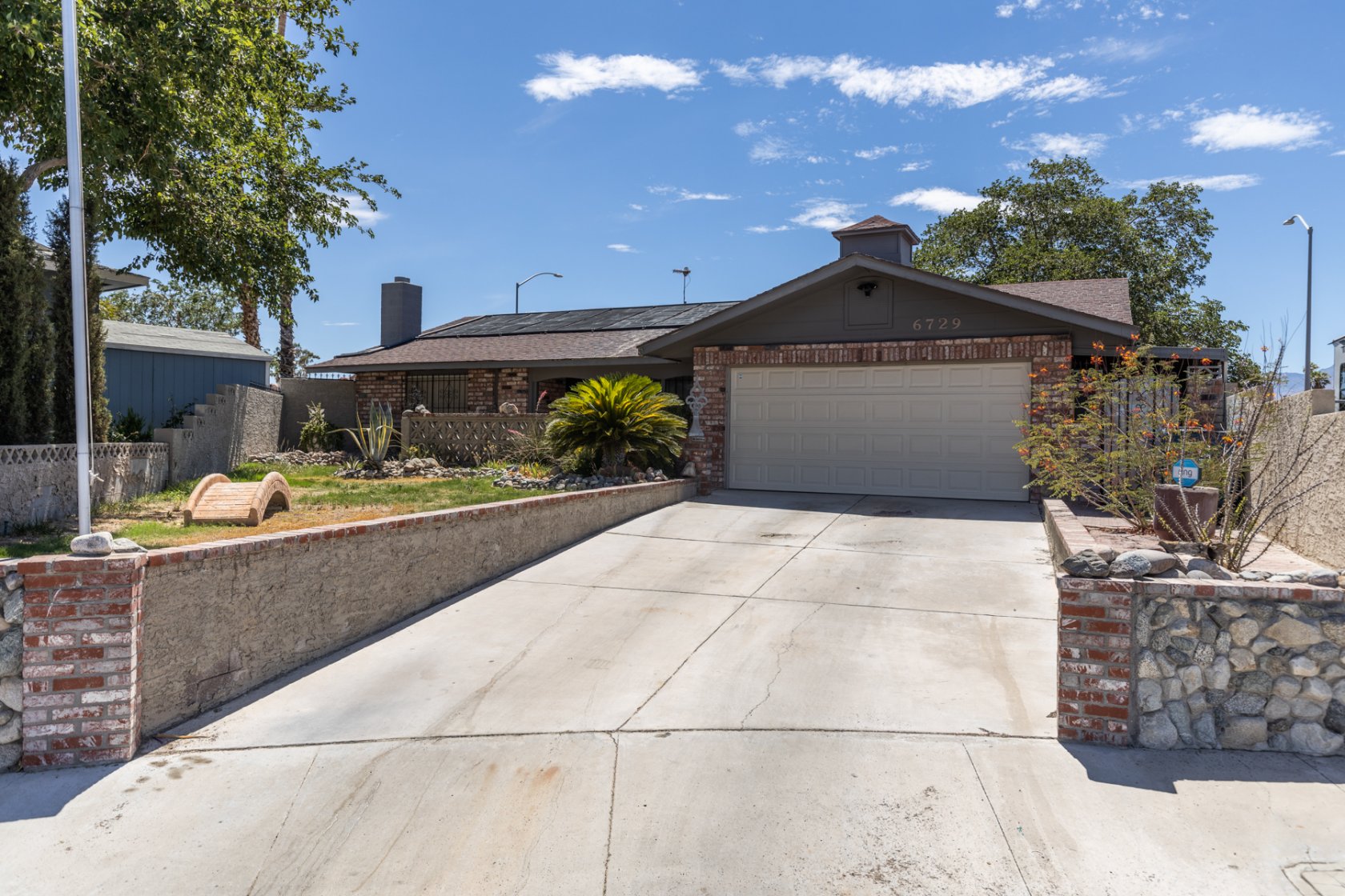 58683 What a great classic Vegas home!! 1391 sq ft single story hideaway located on almost a quarter acre cul-de-sac! The back yard is truly an oasis with a pool, fire pit, multiple seating areas, covered patio......just a great place to get away from it all! This features 3 bedrooms and a den with a fireplace! The kitchen boasts stainless steel appliances and hardwood cabinetry! The front welcomes with a courtyard and a 2 car garage! You gotta see this one while it lasts!