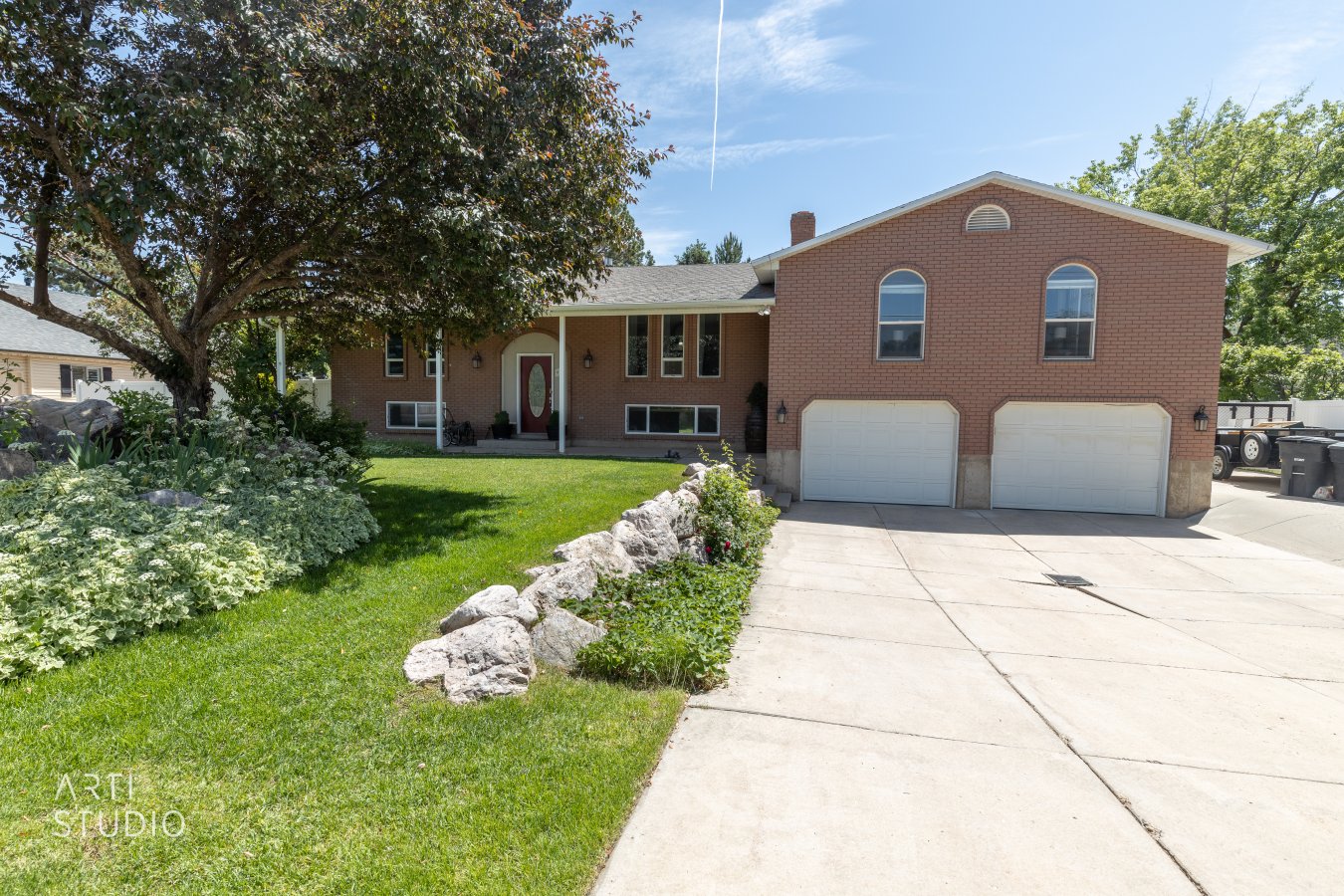 ONE OF A KIND Beautiful, 6 bedroom home with a gorgeous, spacious kitchen featuring granite counter tops, stainless steel appliances, lots of cupboards, tile and hardwood floors throughout! Huge master suite with master bath and jetted tub. Mother-in-law apartment in basement with kitchen, washer & dryer, and separate entrance. Large deck. Cement patio for entertaining, along with RV parking. Lots of trees and vinyl fencing for privacy. Waterfall/pond and landscaped in front. Two AC and furnace units, large 2 car garage, extra deep with extra storage. Great area, close to schools, parks, Highway 89 and I-84, HAFB and shopping. Beautiful area with amazing mountain views.