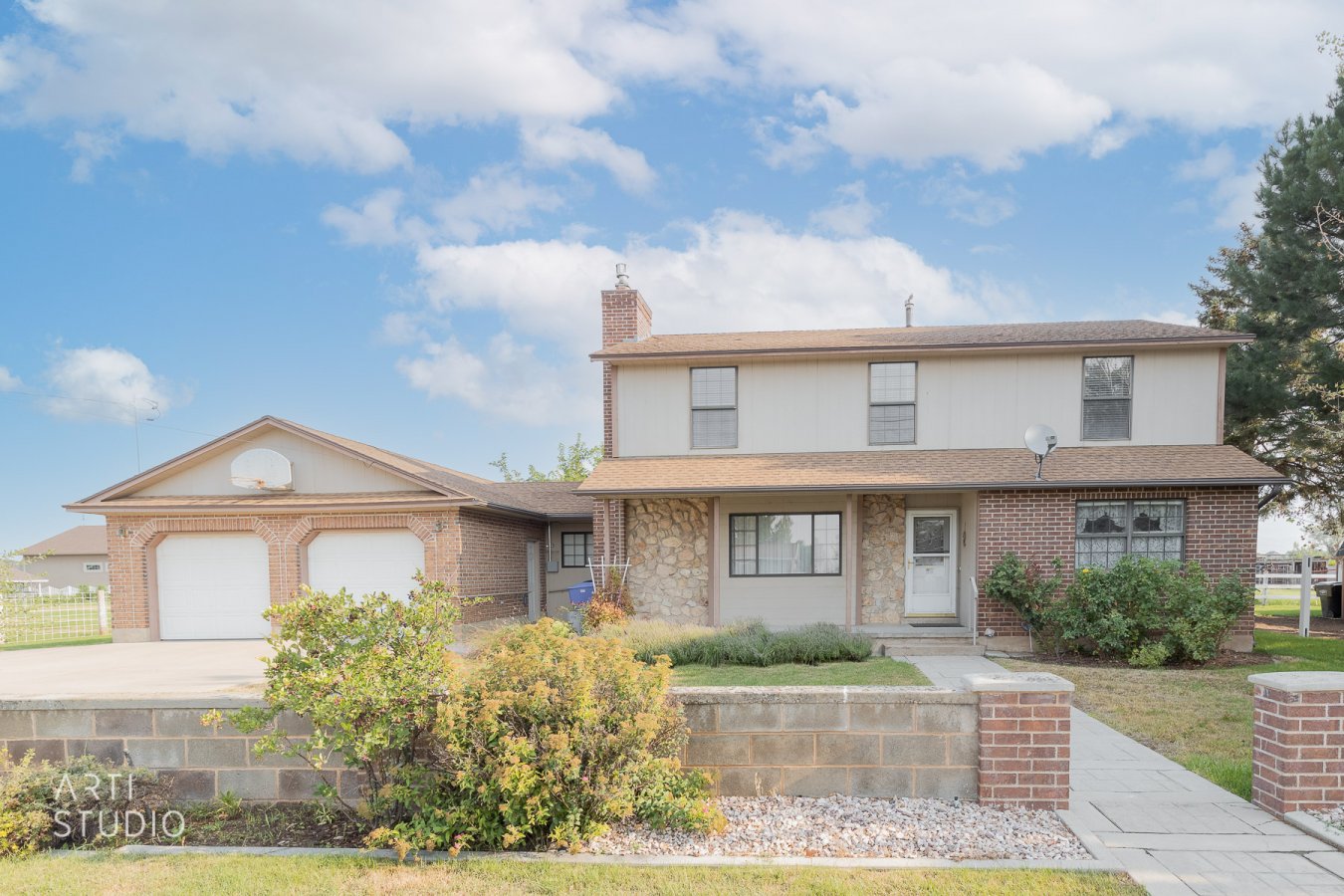 50896 OPEN HOUSE: Saturday, Aug 7th, 11:00am - 2:00pm. This is a rare find! Two-story farmhouse style home on 1.79 acres. 2 large out buildings. 4 bay garage: 66x24 and a 30x45 poll barn. Garden, peach and pear trees. Open kitchen with pull-out drawers. Large food storage/pantry room. tons of storage. Close to schools and shopping. Only 30 miles to Snowbasin Ski Resort. 11 miles from Willard Bay.