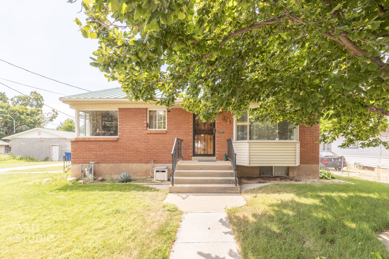 Great brick home with large detached garage. Solar panels are included and paid off. Within walking distance to local schools, shopping, city park, and city swimming pool. Beautiful mountain views. Home is sold as-is. Seller will do no repairs. Sale includes 020-59-0009 and 020-59-0010. Call for a private showing!