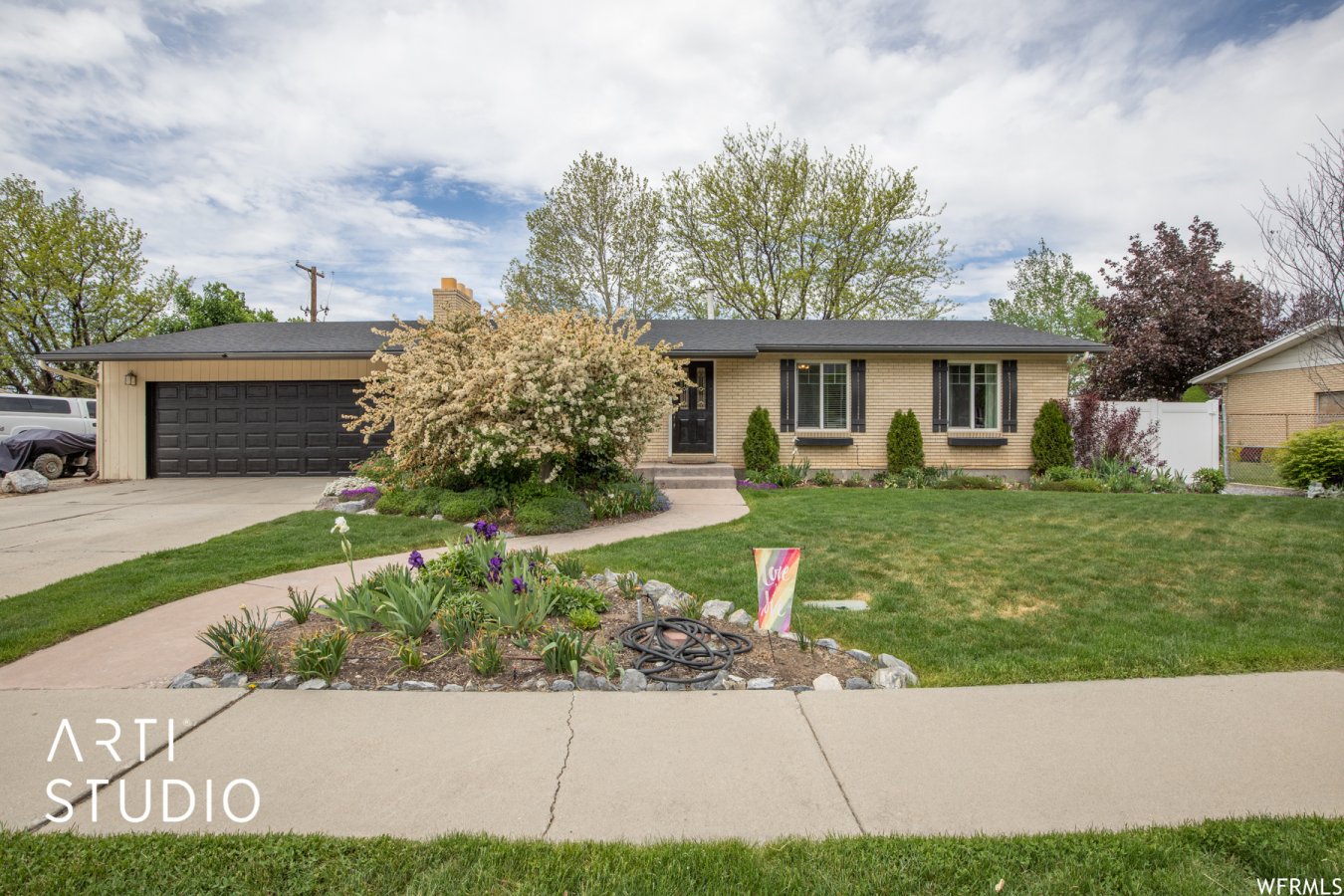 This beautiful brick rambler is in the heart of American Fork and is well kept. It's warm and welcoming feel is great for hosting family gatherings, parties or just curling up next to the wood-burning fireplace and reading a book. Main floor living (3 bedrooms on main) with an additional 2 bedrooms and a spacious laundry room with custom built-in mudroom downstairs. You'll want to check out the oversized 2 car garage that is extra deep and wide. The space to the north and south of the home has plenty of room for your RV and toys! You'll love the whole house fan that has been installed. For those spring and fall nights when you don't want to turn on your A/C but want to cool down the whole house! The impressive backyard has everything you would want and need: large garden, fire pit, a treehouse mansion that was custom-built and a gate that leads directly to Beehive Park/Art Dye Park and the baseball fields! What more can you ask for? This home has a lot of key updated items: newer roof (replaced in 2016), brand new A/C and heater (installed 2021), new sprinkler system (replaced in 2018), custom built-in shelving near fireplace and laundry room (2019), and new vinyl fencing (2019). Come see this perfect home before it's too late! Square footage figures are provided as a courtesy estimate only and were obtained from county records. Buyer is advised to obtain an independent measurement.