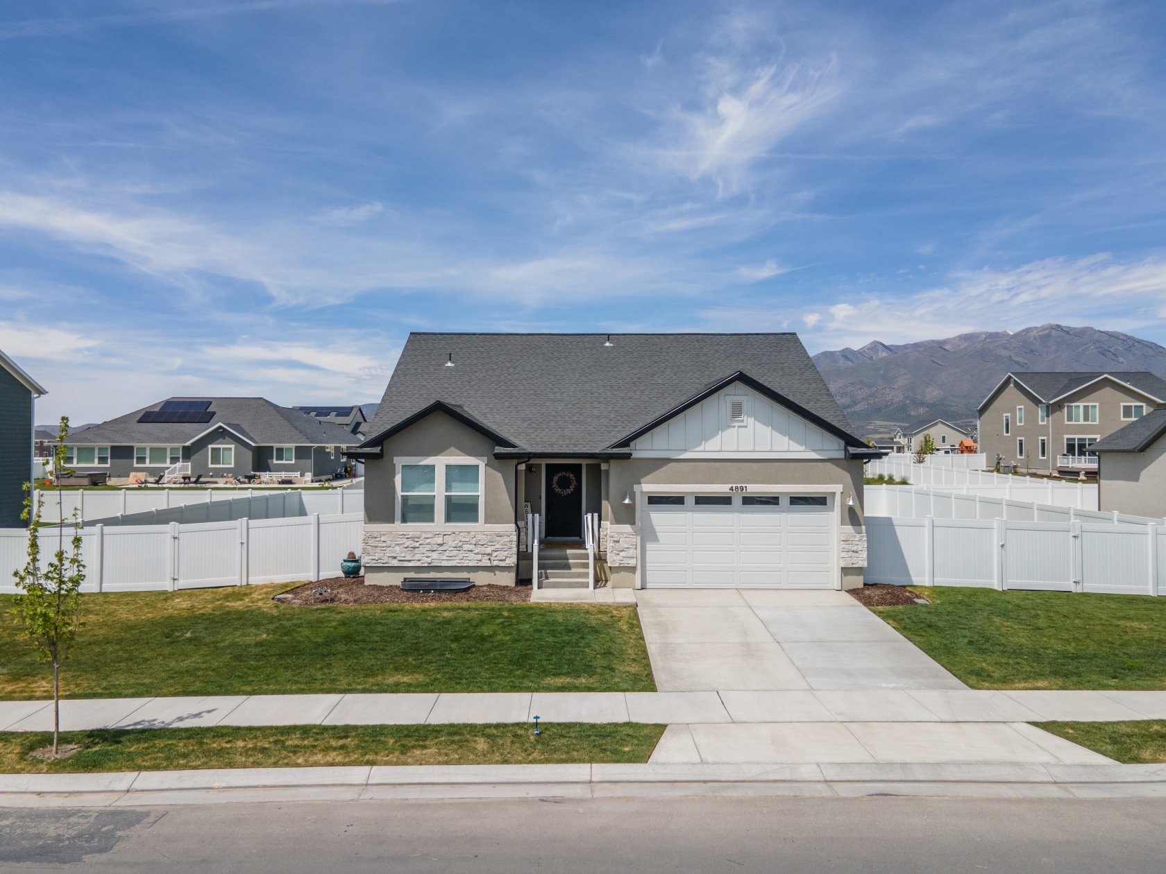 57494 This is a highly desirable neighborhood with no HOA!
The first thing you will notice when driving up to this home is the wide, calm street it sits on.
This elegant, modern ranch-style home is located two tenths (.20) of a mile from this neighborhood’s own thirteen and half (13.5) acre park, which includes a basketball court, three fields, a playground, and four (4) pickleball courts.
It features vaulted main floor ceilings, an open floor plan, and multiple windows, which bring in plenty of natural light. The kitchen features a stylish mosaic backsplash, along with comfort height quartz countertops. Matching the same style exactly, all bathrooms feature the same finishings as the kitchen, including large white shaker cabinets. The main floor includes three (3) bedrooms and two (2) full baths. You will love the main floor master suite, which sits away from the other rooms on the main floor.
Downstairs you will find a spacious and airy entertainment room, and will notice the upgraded carpets that feature tempurpedic padding underneath. The basement offers three (3) additional bedrooms, a full bath, and lots of storage space.
Out back you will see a fully landscaped, and fenced, yard perfect for entertaining and enjoying summer afternoons. This home is backed up against half (½) acre lots which not only makes this quarter (¼) acre yard seem bigger, but provides additional privacy.
This home is beautifully maintained with updated finishes, floorings, and a neutral palette.
The careful, and thoughtful, selection of upgrades sets it apart from every other house in the neighborhood. This home will go quickly!