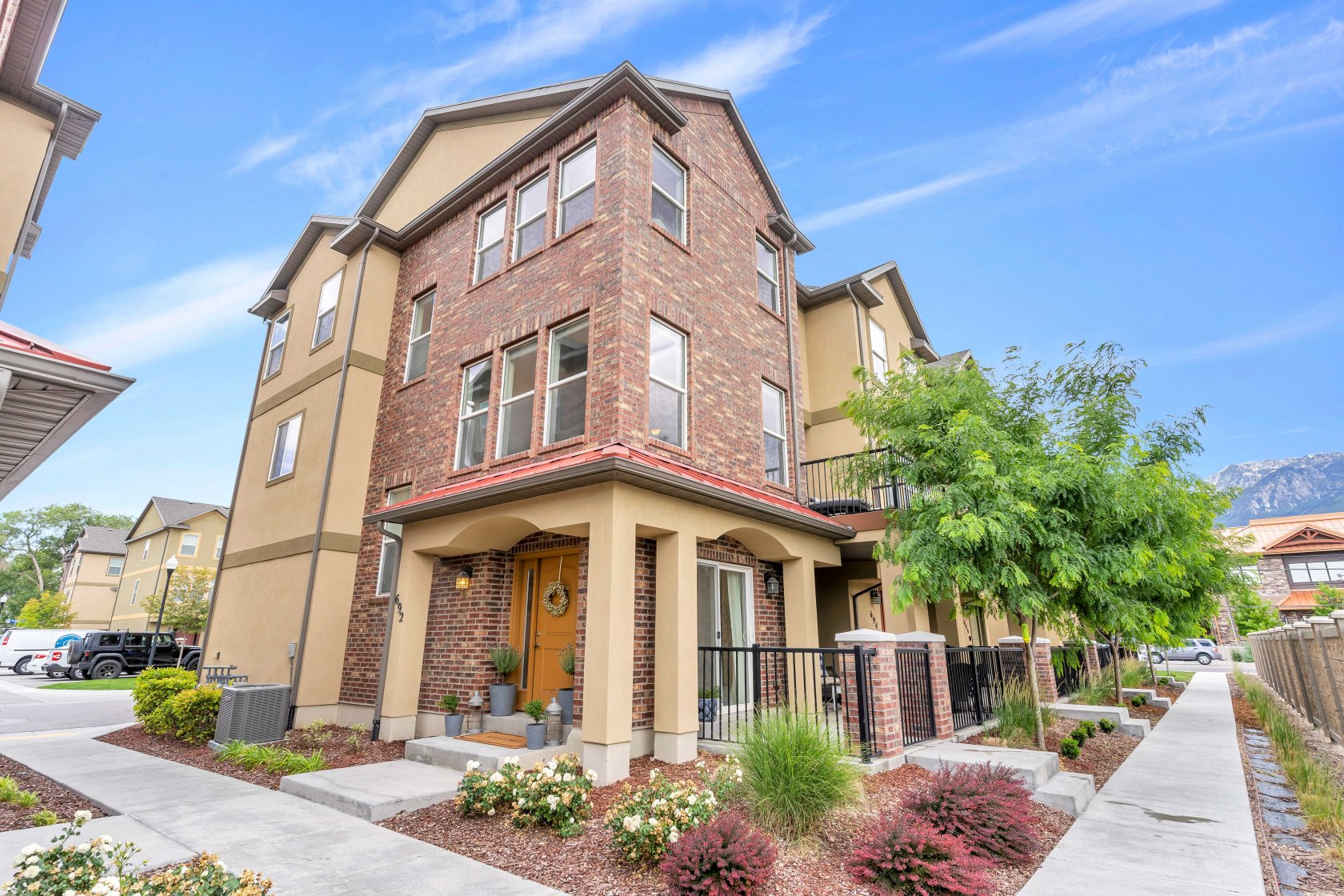 58742 This 3 bedroom, 3 bathroom home is a desirable end unit of Elgin Place community. It's one of the largest floor plans available. Tons of natural light throughout the home. Master bedroom boasts a walk-in closet, walk-in shower, and large separate tub. Marble tile in both upstairs bathrooms. Main level has a large kitchen with an island and plenty of room for a large dining table. Walk-in pantry has plenty of storage space. Back deck off the main level is a great place to catch some sun during the day, and relax in the evening shade. There's a good-sized patio on the entry level as well. There is a two-car garage with a good amount of extra storage space. Well-known boutique market, Pirate O's, is located across the street. This house is move-in ready!