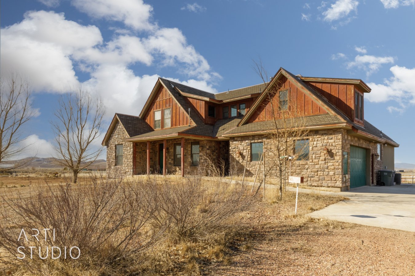 54785 Custom built home with all the upgrades. Extra large barn with 3 horse stalls and large wood working or auto body area or anything else you want to use it for. Barn also has extra parking and storage. Master and another bedroom on the main with a large pantry and $25,000 Thermador appliances, granite, tile, wood floors, and a great theater room. Large covered back patio. Shop has a dust collecting system and is heated. 2 car attached garage and more garage paring in the detached barn. All this on 2.5 acres of horse property.