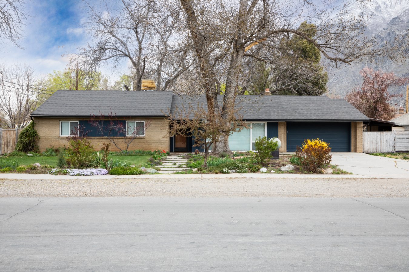 56592 Beautiful, completely updated home. Fully landscaped with mature trees and planter boxes. Home is in excellent condition. New roof within 5 years,outdoor dining area. Detached mini house/playhouse. Potential 4th bedroom in basement.