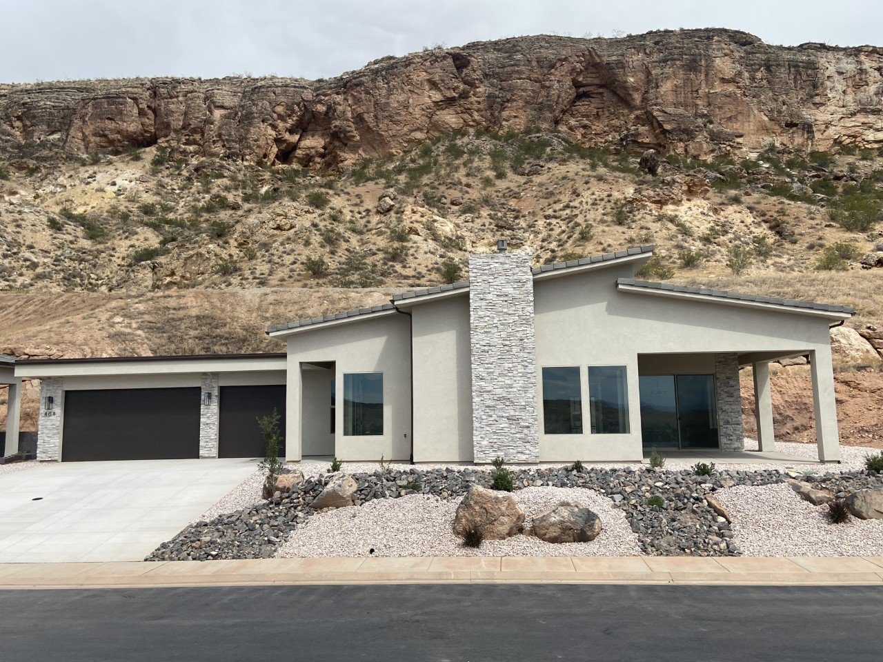 59991 This new subdivision is placed perfectly on the rim of La Verkin. Close to Zion National Park, with gorgeous views of Pine Valley Mountain seen from your living room. This spacious 2 bedroom home has an open floor plan with upgrades including: 8' doors, gas fireplace, wall oven w/ range hood & stove top, gas fireplace, fully landscaped and tile throughout the main living area. MOVE IN READY.