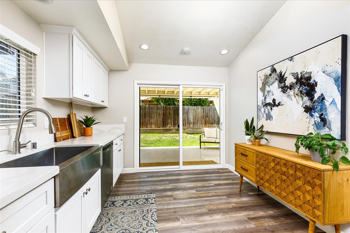57120 This beautifully remodeled home represents style, comfort and a great location! You will be WOWED as you enter the home and are greeted with vaulted ceilings, vinyl plank flooring, cozy fireplace and custom stair railing. The kitchen has been tastefully upgraded with white quartz counter tops and stainless steel appliances. In addition each bathroom has quartz counter tops and tile showers. The spacious floorplan features a downstairs bedroom with a joining bathroom, indoor laundry room and separate dining room. The master bedroom has an attached bath with a nice size walk in closet. Additional upgrades include, recessed lighting, double pane windows and sliding glass door, HVAC system, sprinklers and drains, epoxy garage and patio floors, and shutters downstairs. Located on a cul-da-sac and walking distance to Jurupa Valley Spectrum. Enjoy nearby restaurants, movie theatre, shopping, parks and schools. This home has so much to offer!! You have to come see it to believe it!