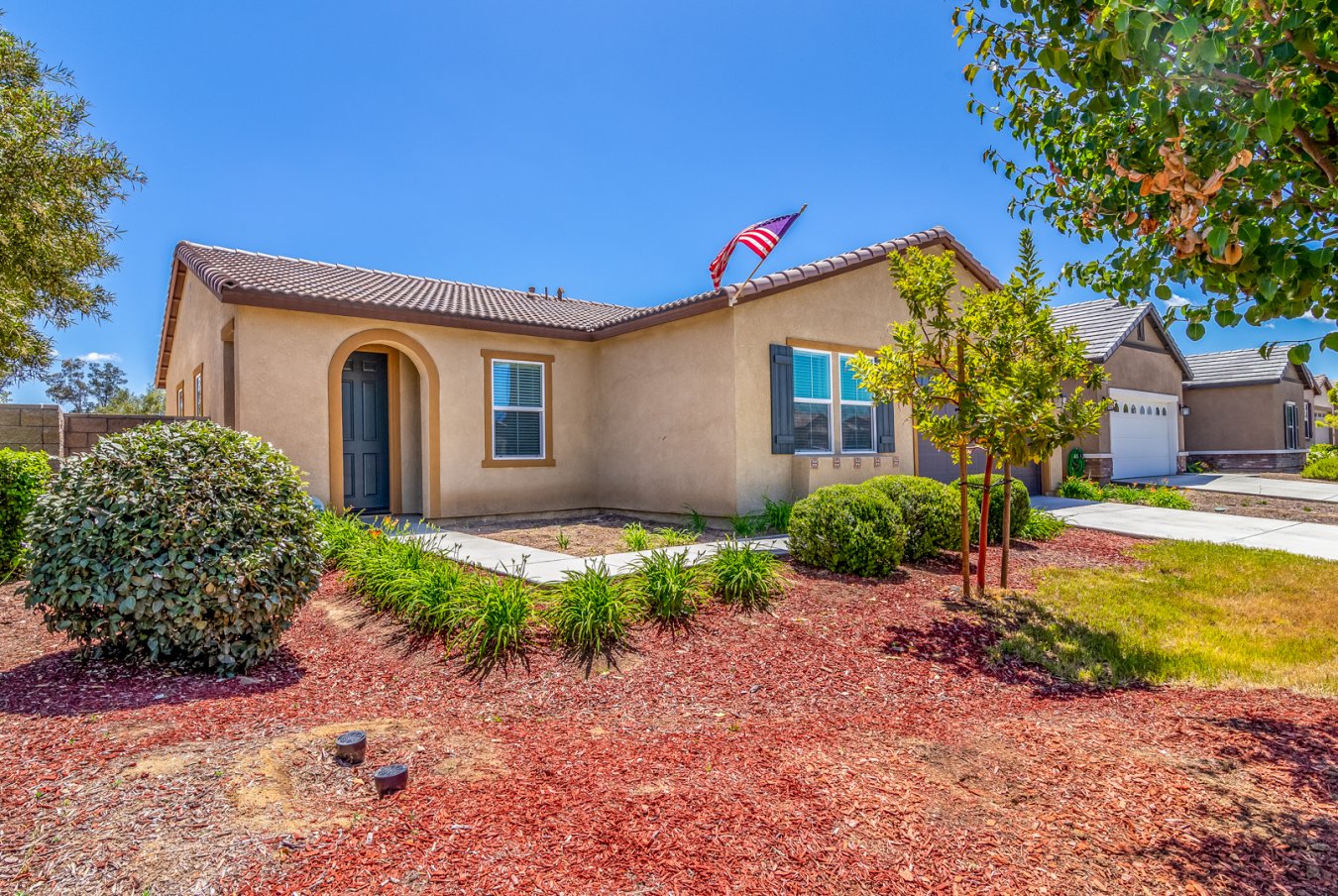 57397 Welcome home to this beautiful SINGLE STORY home located in the popular Menifee, CA neighborhood of Hidden Hills! This three bedroom with a den (that can be converted to a 4th bedroom) and two bath home has plenty of room for the whole family. The open floor plan leads to the spacious eat-in kitchen featuring dark wood cabinets, breakfast bar, stainless steel appliances, and space for a full sized dining table. The kitchen overlooks the family room making it ideal for entertaining. The whole home is painted with a neutral interior color making for a cozy and welcoming home. Enjoy the primary suite with an attached primary bath featuring dual sinks, glass shower surround, and walk in closets. The remaining bedrooms share a hallway bath and there is a seperate laundry room for added convenience. This energy efficient home has installed solar panels and drought tolerant artificial turf installed in the oversized backyard with plenty of room to make all your own personal touches! With an ideal location close to local schools, shopping, restaurants, and easy freeway access this home is a must see!
