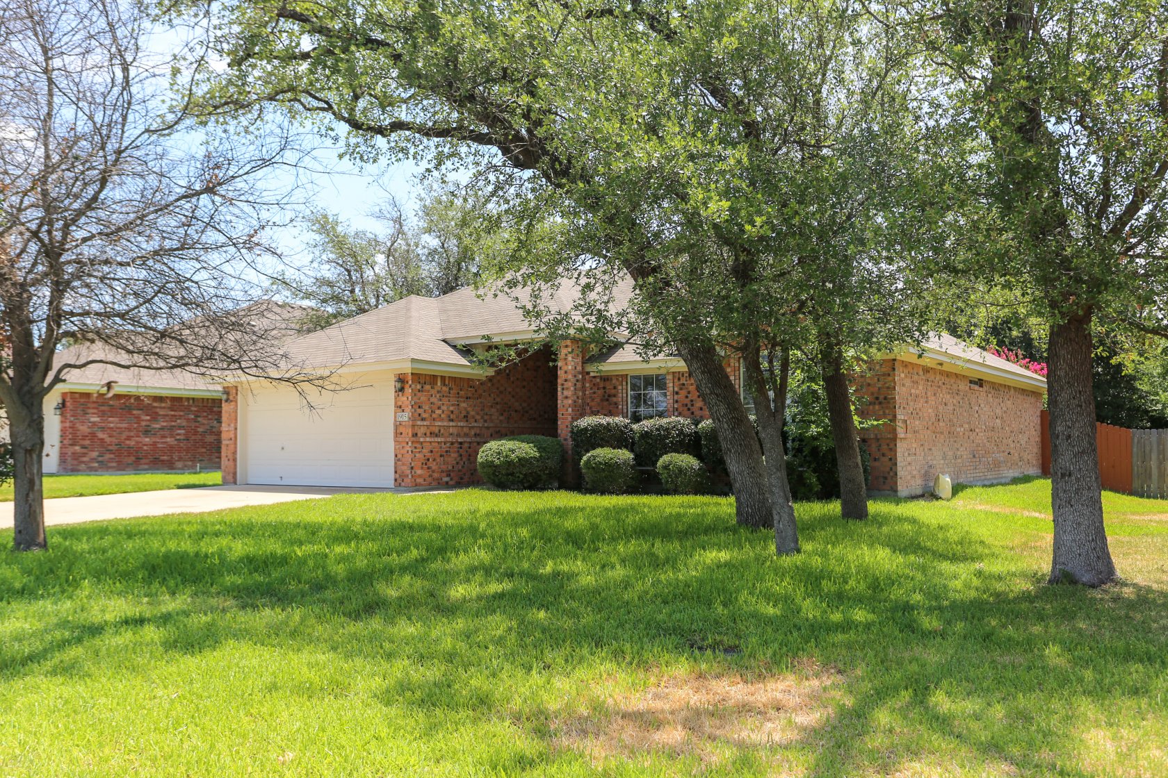 58768 Welcome home to this gorgeous 3 bedroom, 2 bath, 1698 Square Ft home located in Knights Ridge Addition. You are greeted by a Texas star front door that leads into a ceramic tiled foyer. The living room offers carpet, a ceiling fan, and cozy fireplace and leads directly to the kitchen and breakfast area. The kitchen boasts granite countertops, stainless steel appliances, a breakfast bar, ceramic tile backsplash, recessed lighting, and pantry. The tiled breakfast area gives you direct access to the covered back patio and privacy fenced back yard. Two ample sized minor bedrooms are serviced by a full hall bath. The main bedroom offers raised ceilings, a huge walk-in closet, and tons of natural light. A separate shower, double vanity, and jetted garden tub in the main bath complete this spacious owners retreat. Schedule your private showing today.