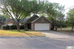 60275 Understated elegance, overwhelming charm, and a fantastic location sets this residence apart from the rest!!! Centrally located in Harker Heights Tanglewood North, you will find this 3 bedroom two bath move in ready. This home offers custom kitchen backsplash, chair molding, six panel interior doors, lots of cabinet space, and over 1600 sf of ceramic tile throughout the home. Enjoy the quiet seclusion of having neighbors on only one side, relaxing in the back yard with mature shade trees, and a covered patio. This is an outstanding property: schedule a showing today before its too late...