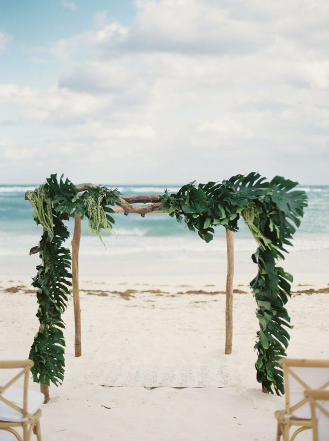 Monstera leaves beach wedding ceremony chuppah Monstera leaves beach wedding ceremony chuppah