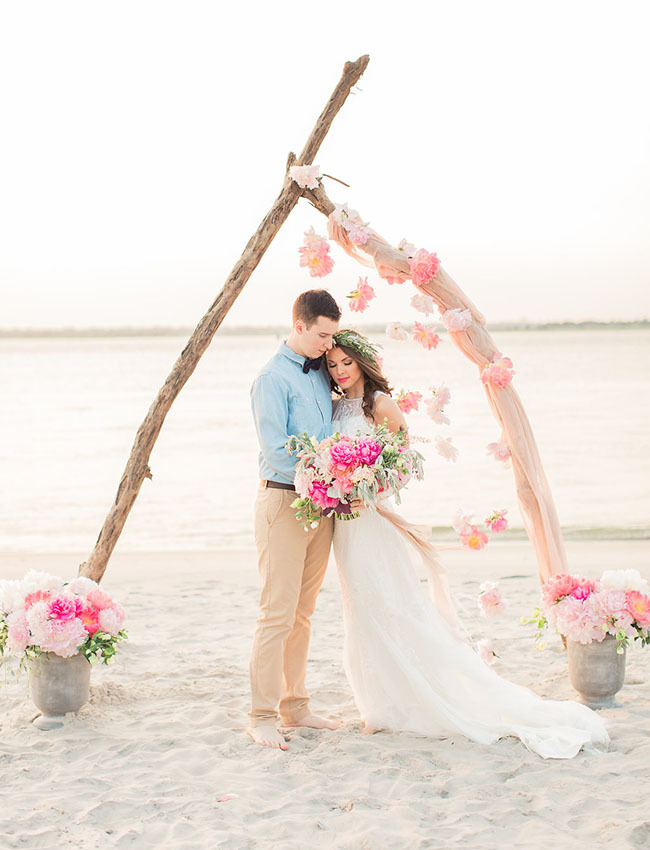 Simple beach elopement with driftwood floral arch Simple beach elopement with driftwood floral arch