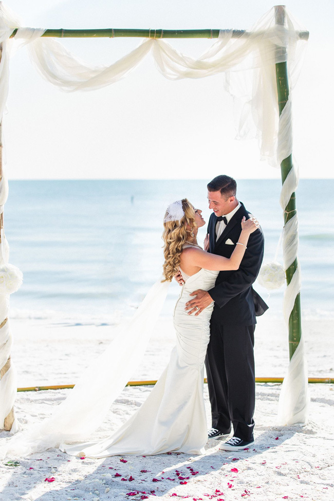 Bamboo beach wedding arch with white fabric Bamboo beach wedding arch with white fabric