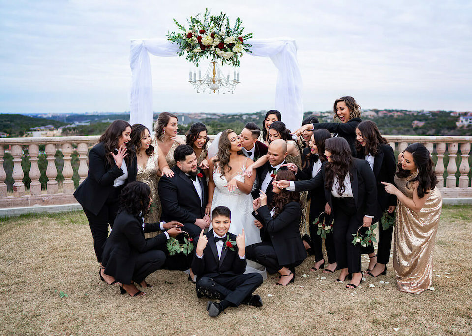 26 Alternative Wedding Ideas That Beautifully Break Tradition | Mixed gender wedding party posing for a cute photo