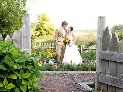 Cage and Aquarium Photography Bride and groom in the garden by Cage and Aquarium.