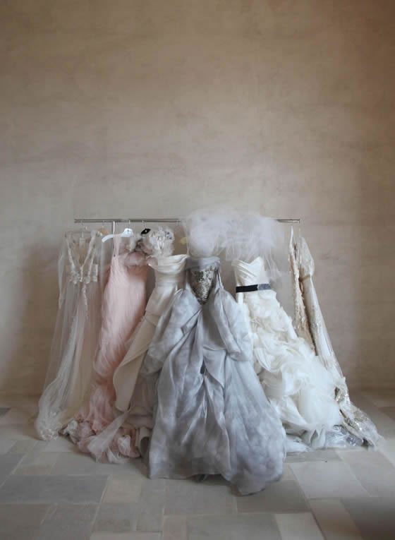 Rack of vintage bridal gowns Elizabeth Messina Photography Rack of vintage bridal gowns Elizabeth Messina Photography