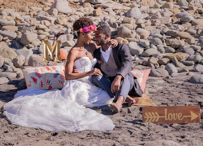 Romantic Elopement Announcement Photos Romantic photo of a bride and groom on the beach