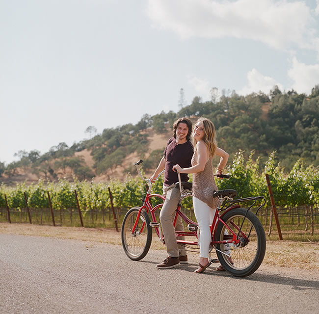 Engagement photos on a bike