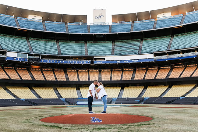 Engagement photos at a stadium Engagement photos at a stadium