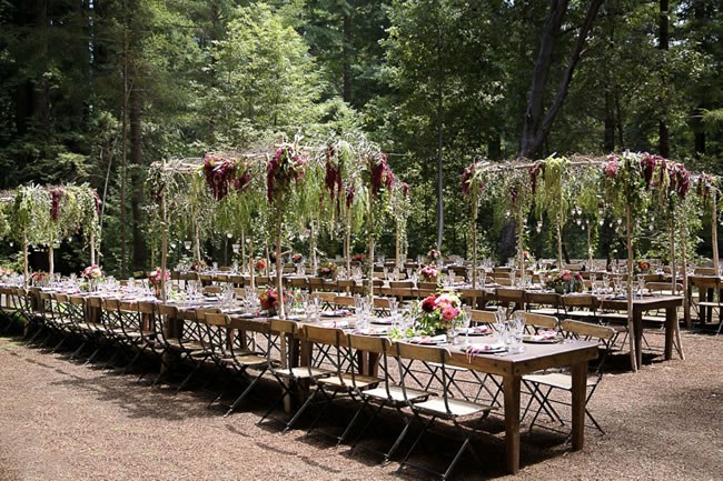 Enchanted Forest Wedding Reception An enchanted forest wedding reception with hanging florals