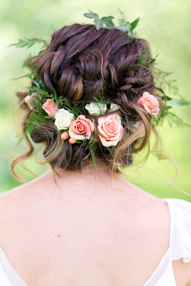 A floral wedding crown with pink roses and hypericum berries A floral wedding crown with pink roses and hypericum berries