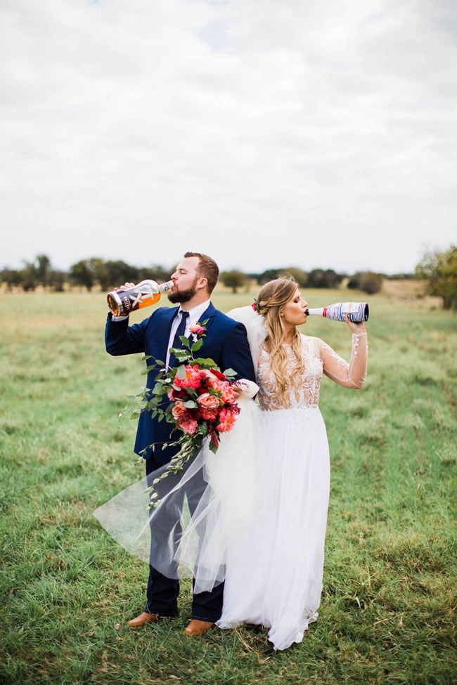 Things To Be Grateful For During Wedding Planning Bride and groom chugging wine from the bottle