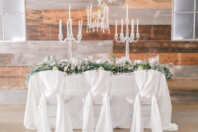 Clear lucite Chiavari chairs and acrylic candelabras