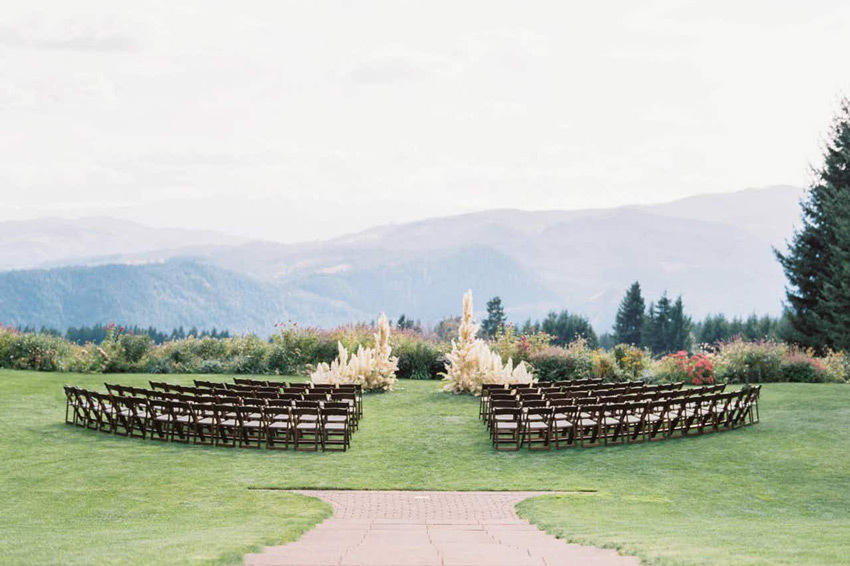 Minimalist Outdoor Wedding with pampas grass arch at Gorge Crest Vineyards in Washington Minimalist Outdoor Wedding with pampas grass arch at Gorge Crest Vineyards in Washington