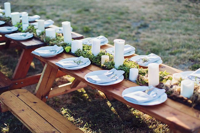 Moss Wedding Table Decor Natural wooden tables with a simple moss table runner