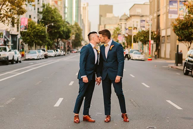 Everything you need to know about San Francisco Weddings Two grooms kiss in the streets of San Francisco