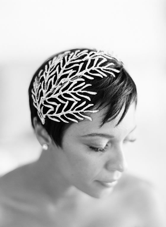 Beach wedding décor idea: Coral Bride with a coral headpiece